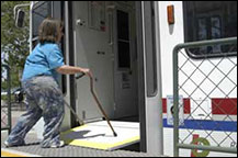 image of limited mobility person entering trax